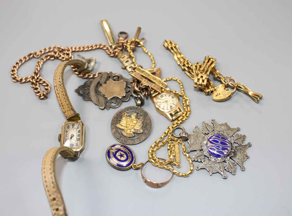 A yellow metal albert stamped 9c, hung with three medallions including 9ct gold masonic and other jewellery & watchs.
